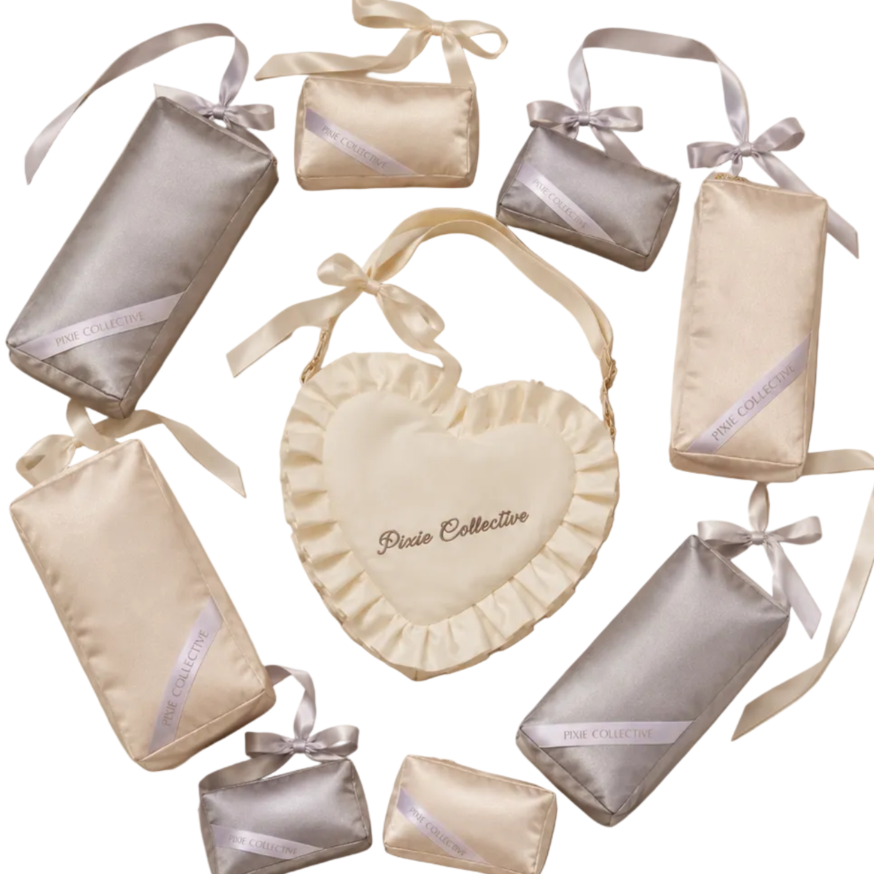 Pixie Collective gift set including a cream heart-shaped bag and matching silver and cream purse pillows in various sizes